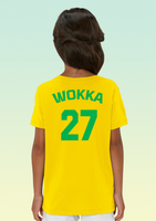 The back of a girl wearing a yellow cotton t-shirt featuring bold green ‘WOKKA’ text above a large number 27—styled with RAF Chinook pride.
