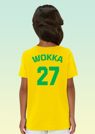 The back of a girl wearing a yellow cotton t-shirt featuring bold green ‘WOKKA’ text above a large number 27—styled with RAF Chinook pride.