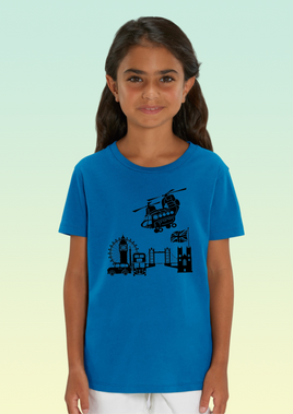 A girl wearing a royal blue heavyweight organic cotton t-shirt featuring black Chinook helicopter design flying over London’s landmarks including Tower Bridge and Big Ben.