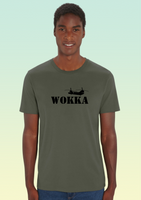 A man wearing a khaki heavyweight cotton t-shirt with black print of a stylised Chinook helicopter above bold text WOKKA.