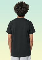 The back view of a boy wearing a plain black t-shirt.