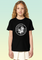 A girl wearing a black cotton t-shirt with a crisp white circular Chinook helicopter graphic printed on the chest.