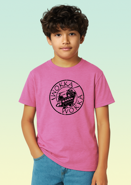 A boy wearing a pink cotton children’s t-shirt with black circular Chinook helicopter print on the front.