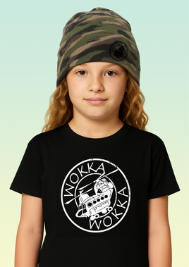 Child wearing a black t-shirt with Wokka Wokka logo and a camouflage beanie.